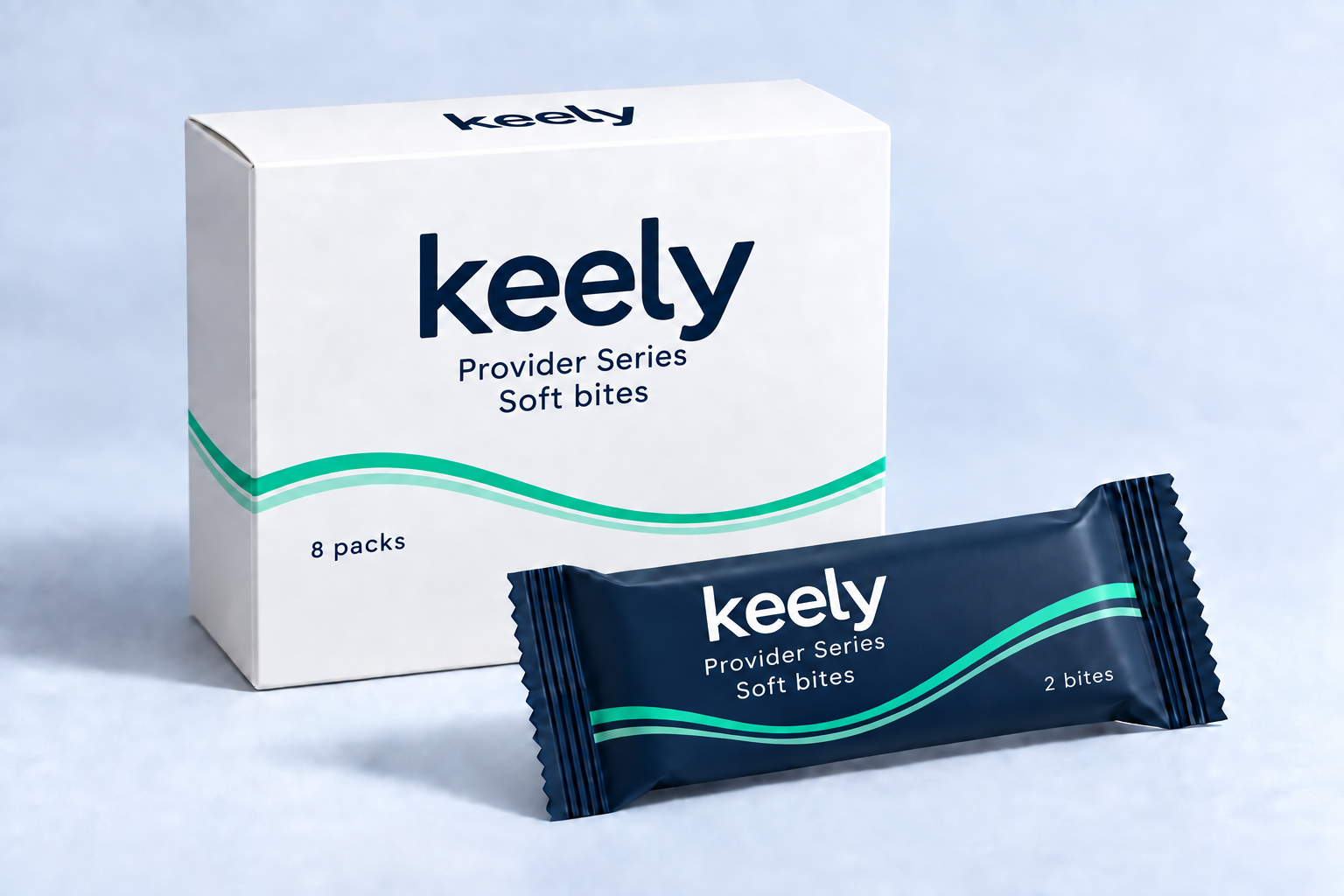 keely Provider Series packaging concept: white carton and navy two-bite wrapper with lowercase lettering and paired emerald waves matching the original range